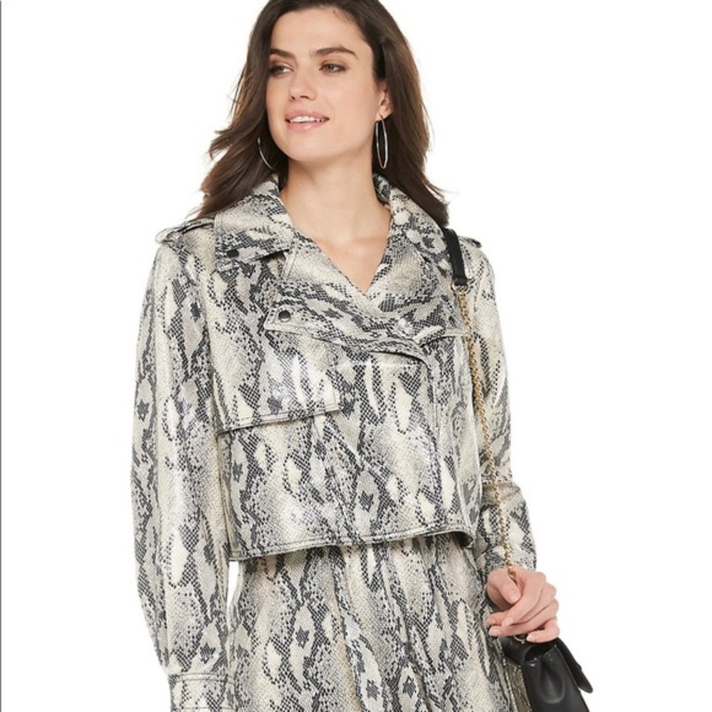 Jennifer Lopez Snake print jacket.